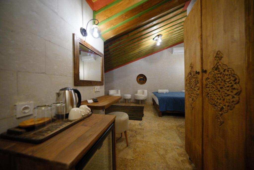 Příslušenství pro přípravu čaje a kávy v ubytování Mayda Cappadocia