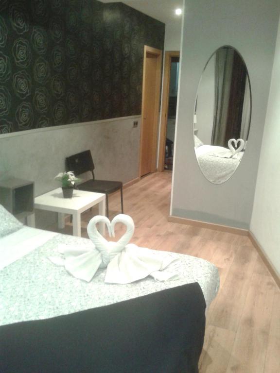 Cama o camas de una habitación en Hostal New Life Madrid