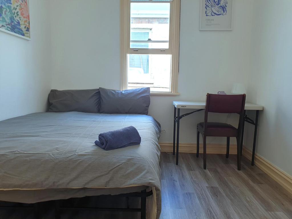 Postel nebo postele na pokoji v ubytování Fitzroy Private Rooms - 132 Nicholson Homestay