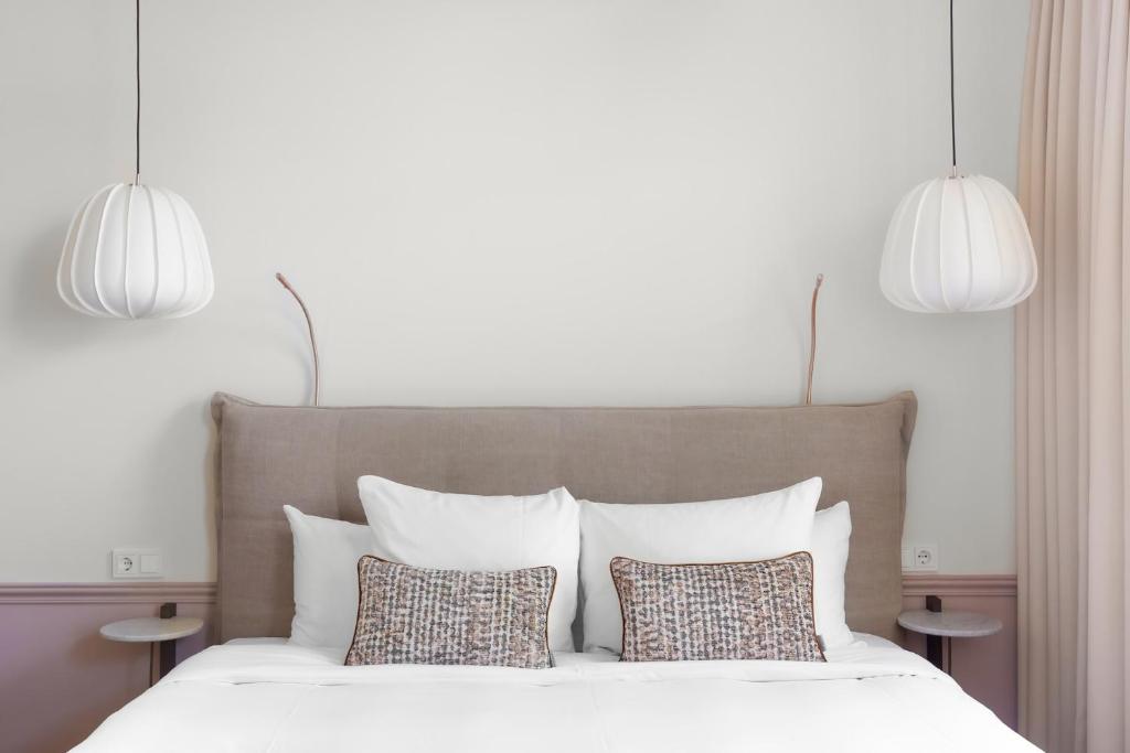 Postel nebo postele na pokoji v ubytování Eclectic Hotel Copper