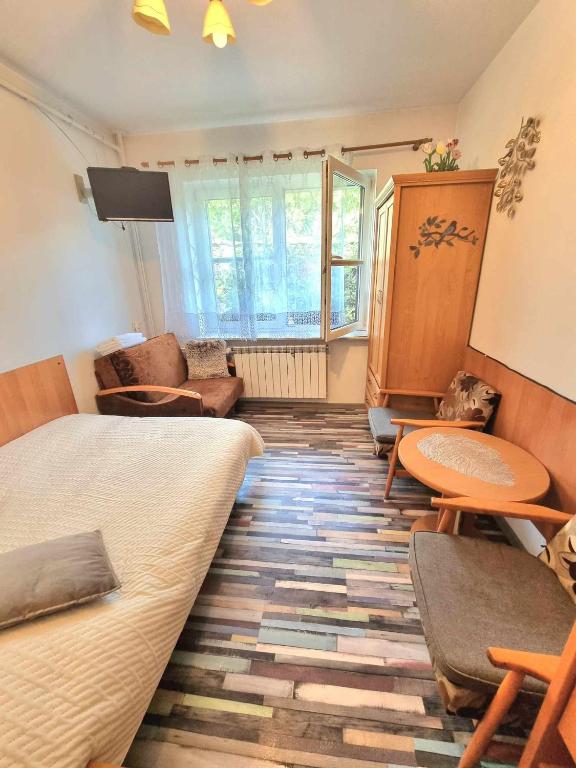 Posedenie v ubytovaní Kacperek w centrum Willowa 4A