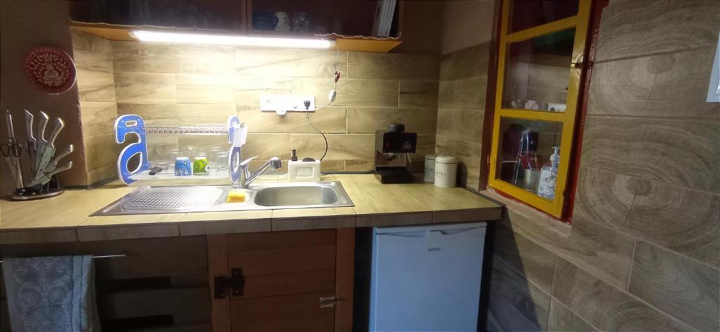 Kuchyň nebo kuchyňský kout v ubytování Póni Kuckó Vendégház és Minifarm