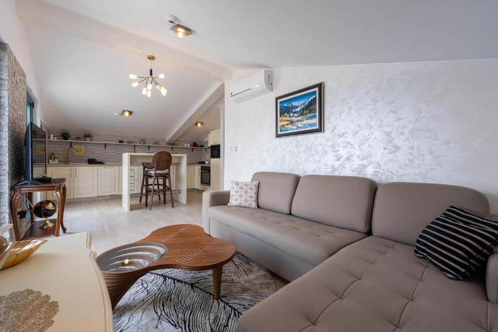 TV a/nebo společenská místnost v ubytování Villa Sonja Apartments
