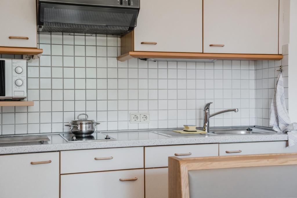 Kuchyň nebo kuchyňský kout v ubytování Residence Erika - Apartments, Breakfast & Sauna