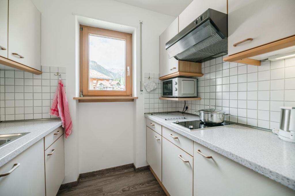 Kuchyň nebo kuchyňský kout v ubytování Residence Erika - Apartments, Breakfast & Sauna