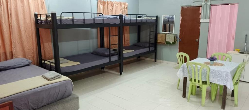 Postel nebo postele na pokoji v ubytování Resort Iman D'Semungkis