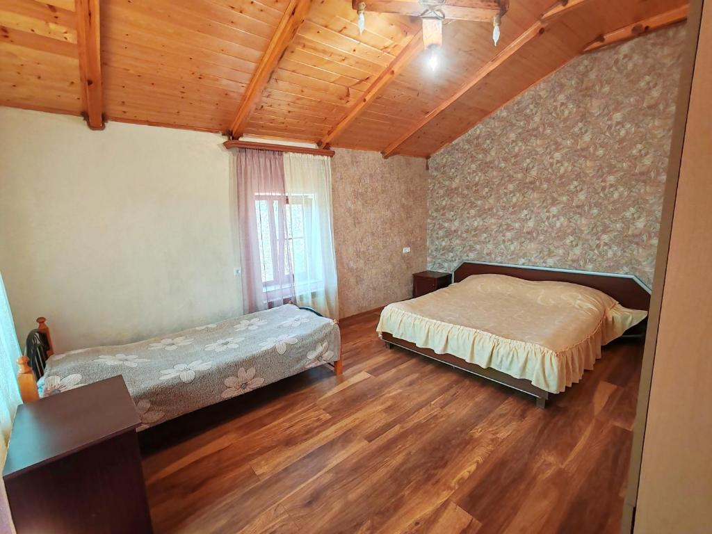 Postel nebo postele na pokoji v ubytování Paradise Guest House