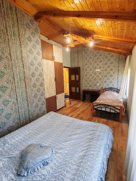 Postel nebo postele na pokoji v ubytování Paradise Guest House