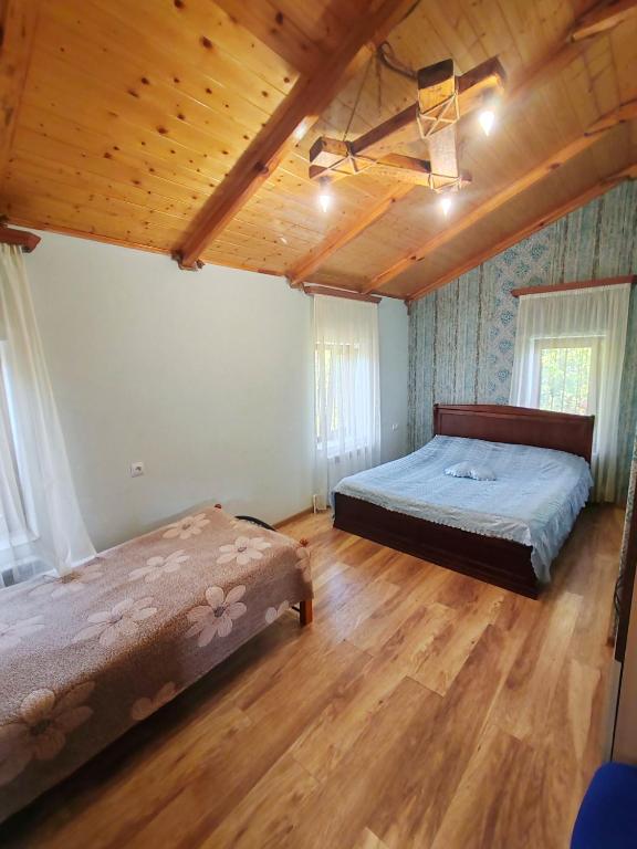Postel nebo postele na pokoji v ubytování Paradise Guest House