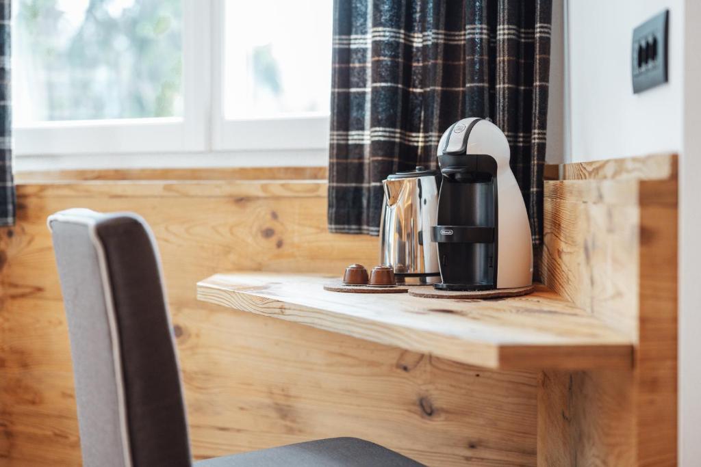 Příslušenství pro přípravu čaje a kávy v ubytování Bio Boutique Hotel Laurino