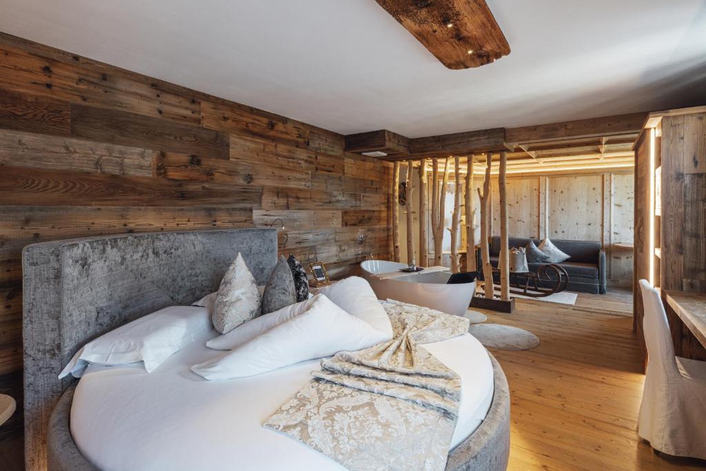 Postel nebo postele na pokoji v ubytování Bio Boutique Hotel Laurino