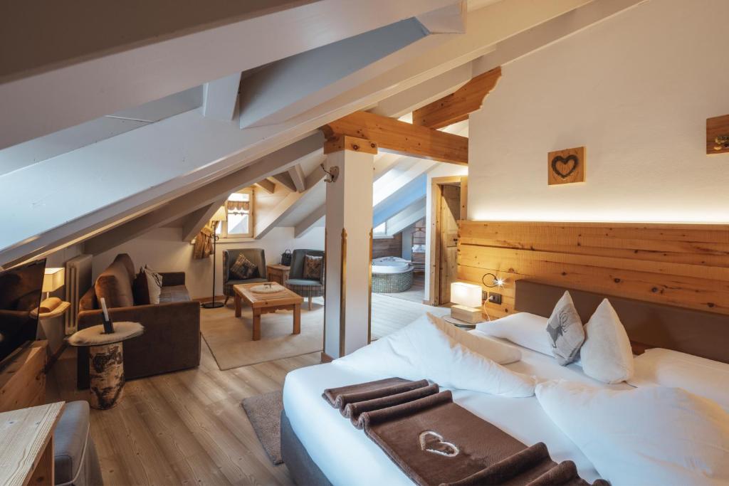 Postel nebo postele na pokoji v ubytování Bio Boutique Hotel Laurino