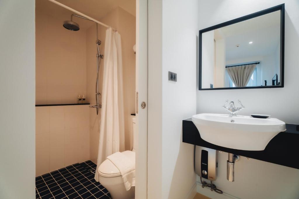 Een badkamer bij Xinlor House - Phuket Old Town