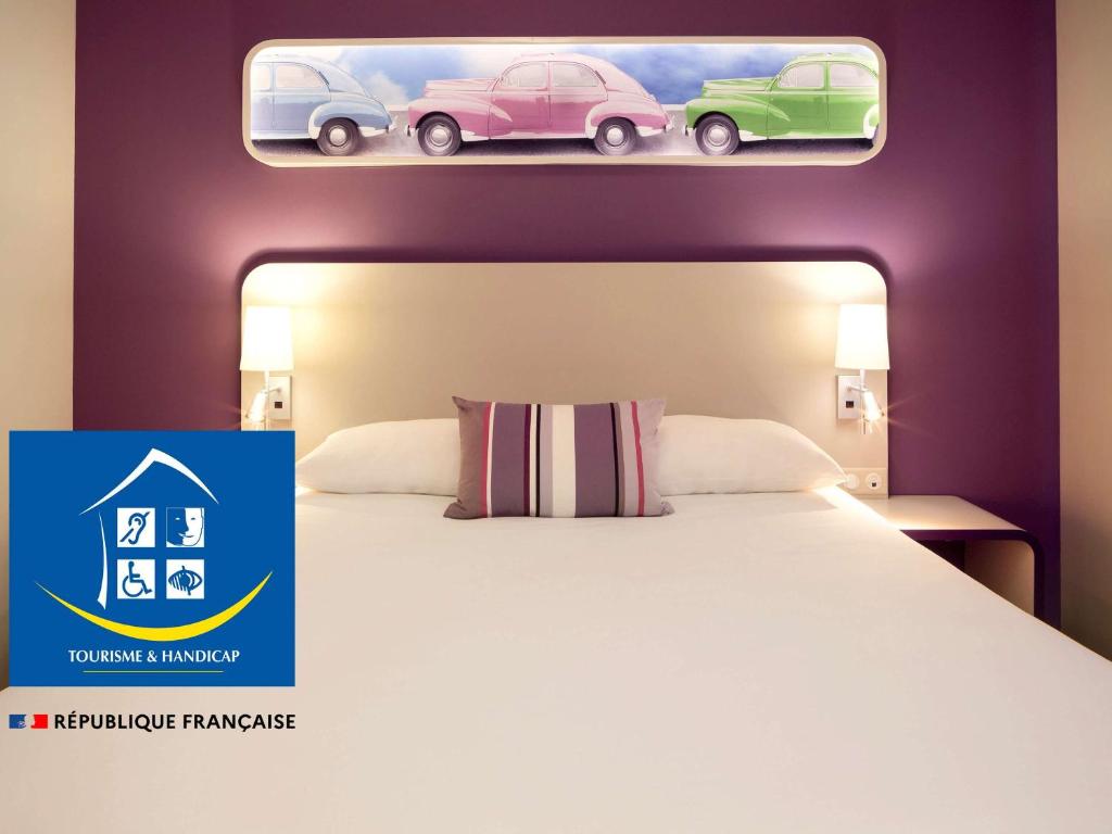 Postel nebo postele na pokoji v ubytování ibis Styles Montbéliard