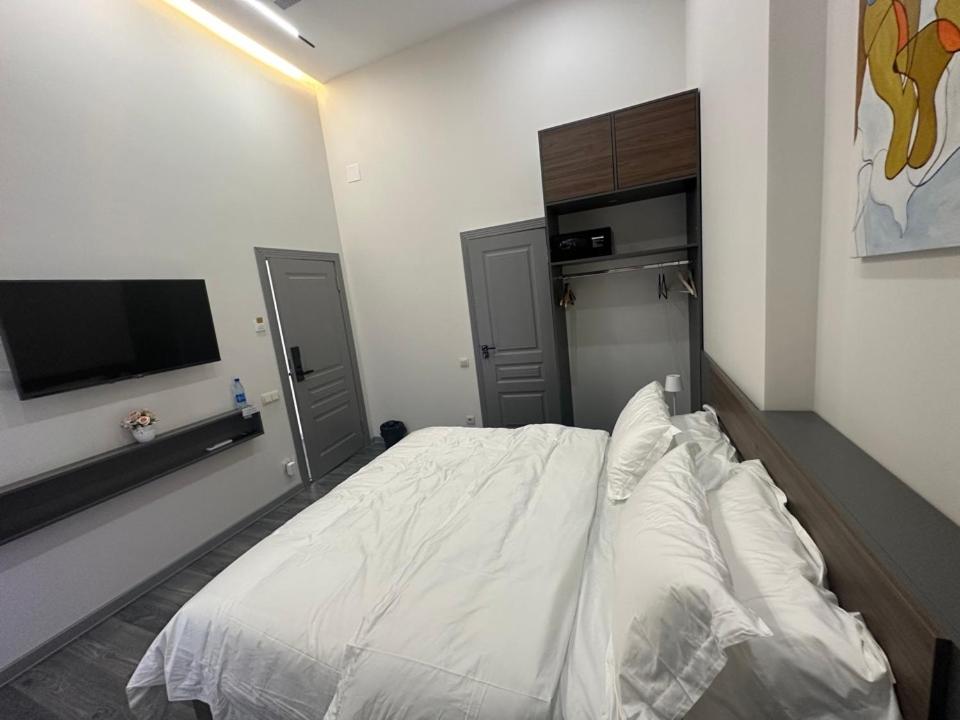 Postel nebo postele na pokoji v ubytování Amir inn