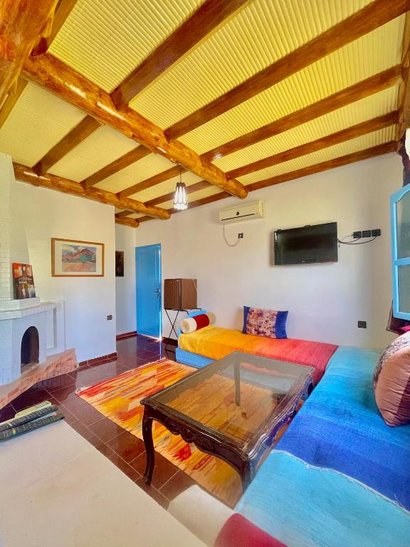 Postel nebo postele na pokoji v ubytování Hotel L'Arganier d'Ammelne