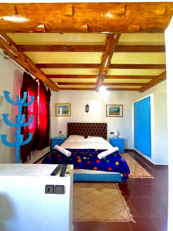Postel nebo postele na pokoji v ubytování Hotel L'Arganier d'Ammelne