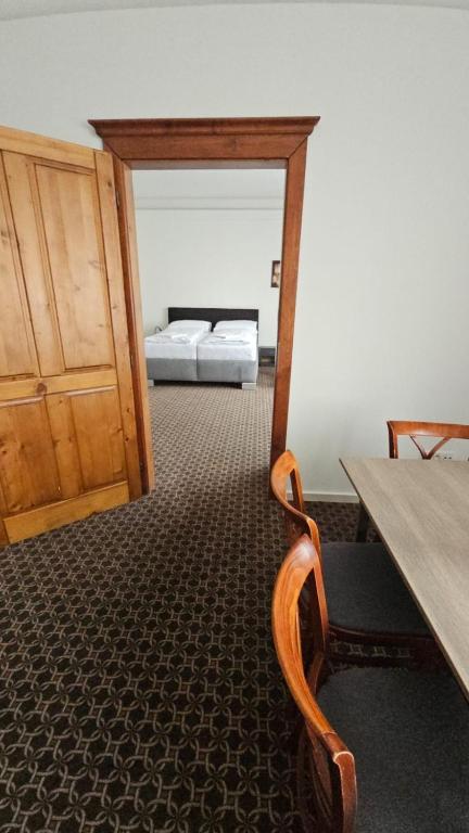 Postel nebo postele na pokoji v ubytování Apartmány LAGUNA