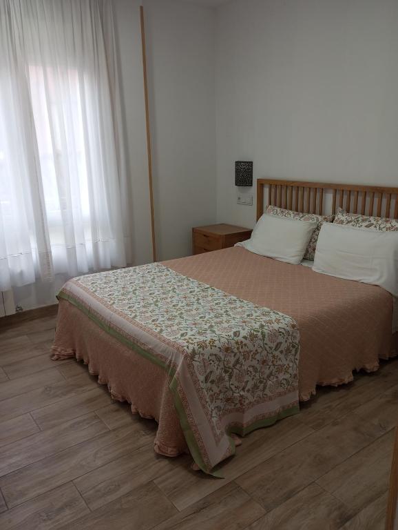 Postel nebo postele na pokoji v ubytování Hospedaje Magallanes