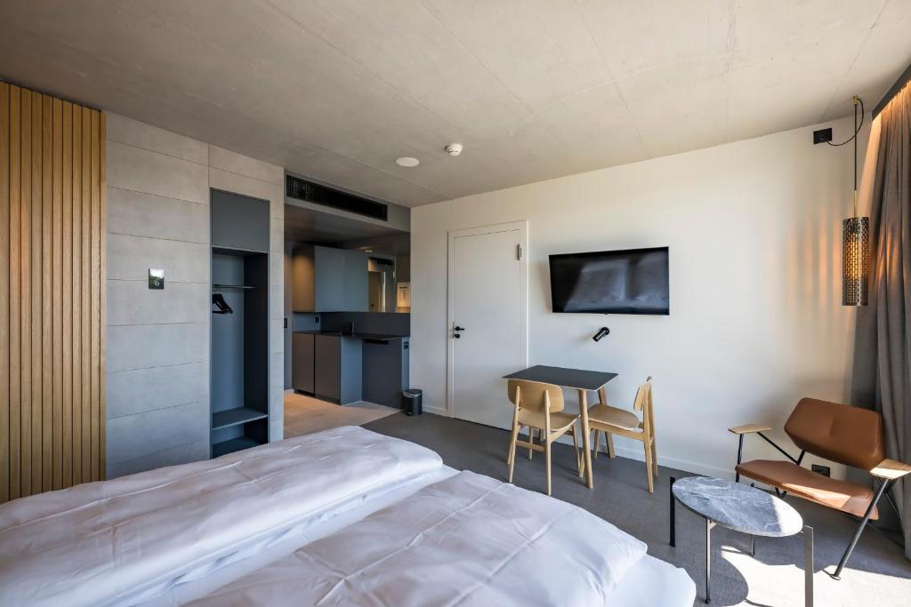 Postel nebo postele na pokoji v ubytování Zleep Hotel Zürich-Kloten