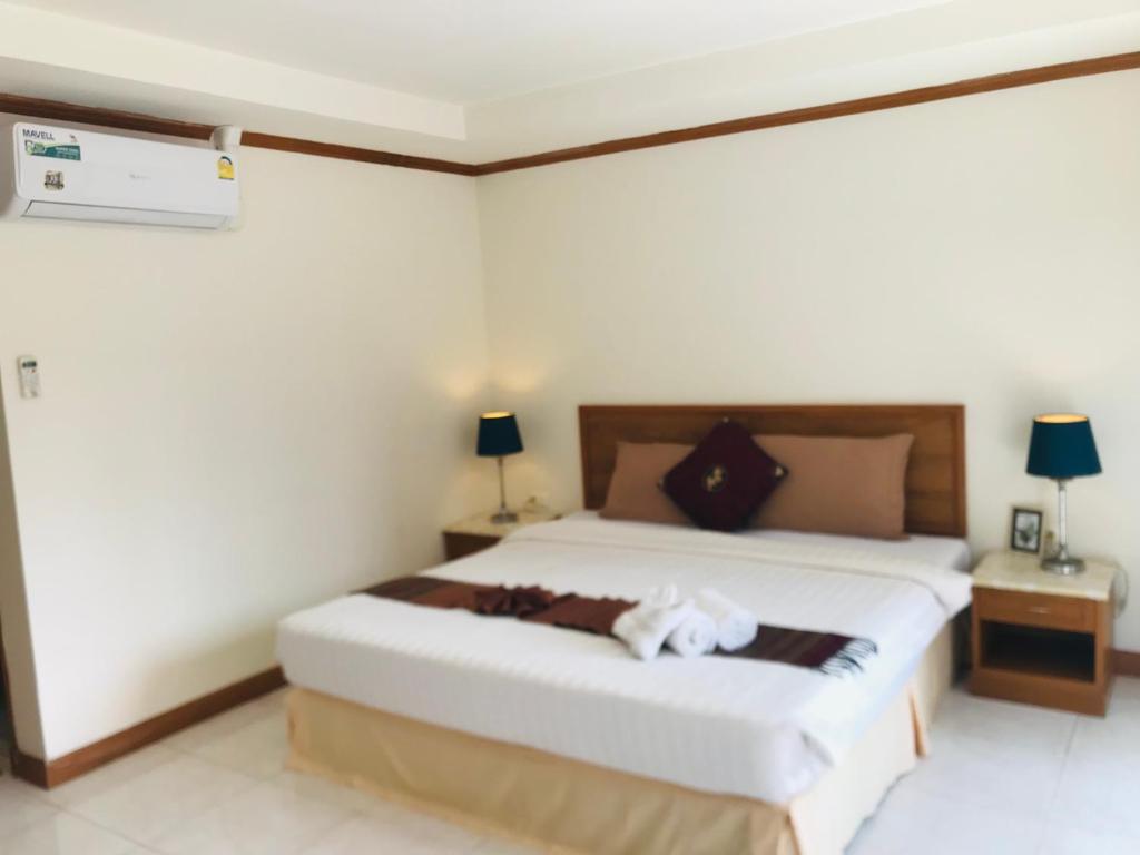 Postel nebo postele na pokoji v ubytování Global Hotel Beach View