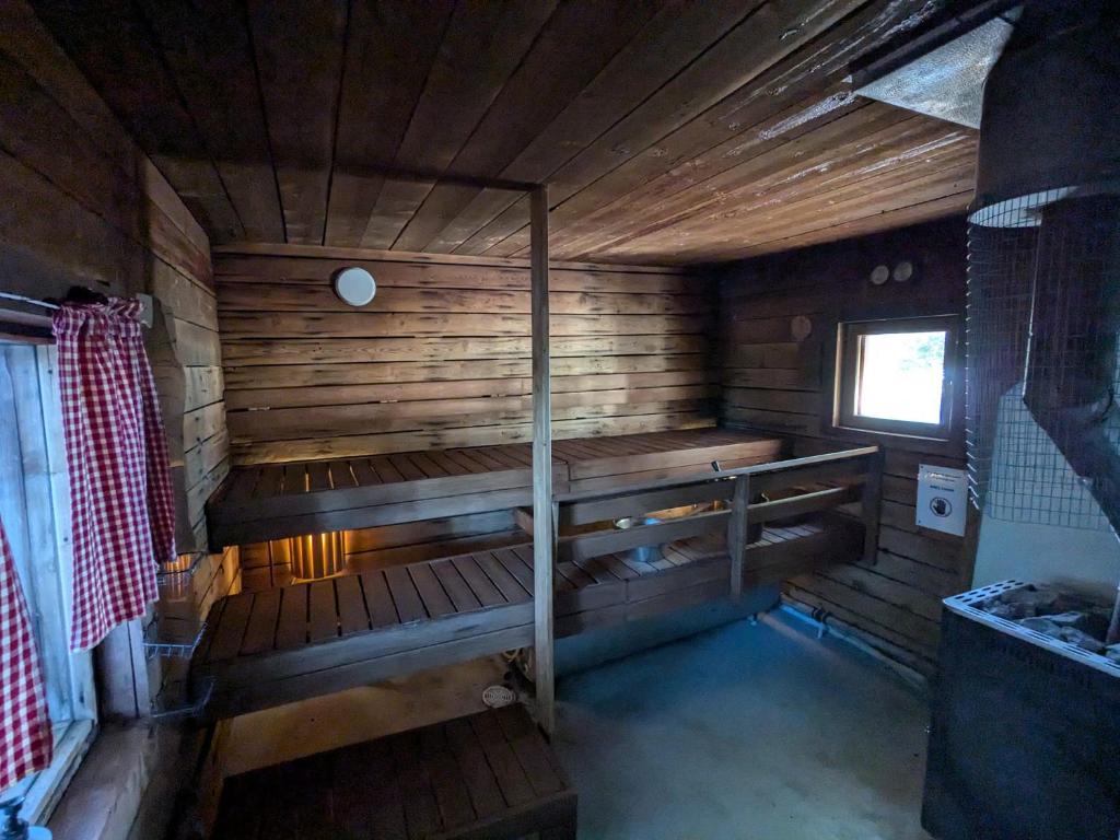 Postel nebo postele na pokoji v ubytování Santa's Little Village - Hotel Uitonniemi