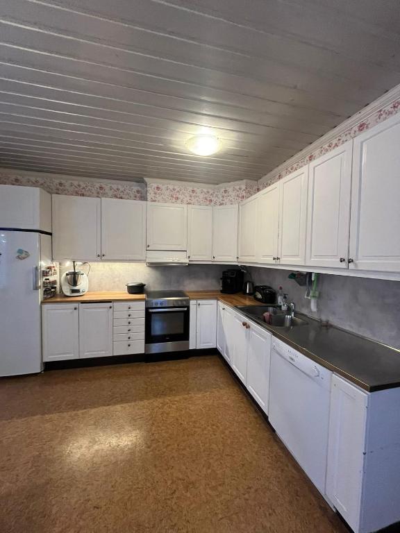Kuchyň nebo kuchyňský kout v ubytování Room Sebi