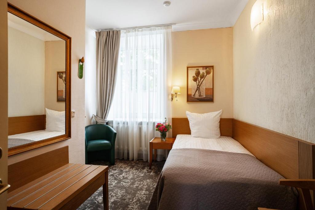 Postel nebo postele na pokoji v ubytování Mabre Residence