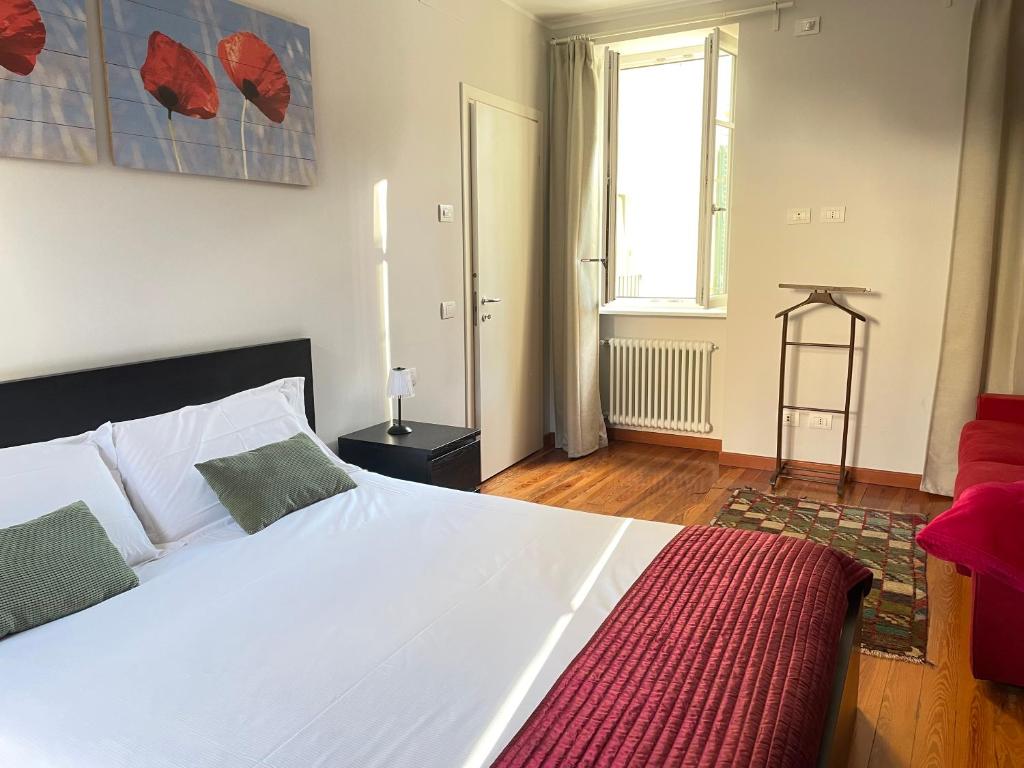Posteľ alebo postele v izbe v ubytovaní Casa Lari Stresa