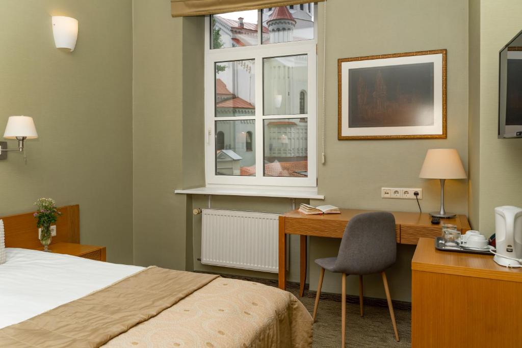 Postel nebo postele na pokoji v ubytování Mabre Residence