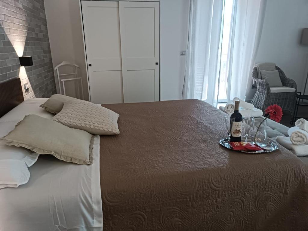 Łóżko lub łóżka w pokoju w obiekcie Casa Rosamari - su Lago di Posta Fibreno, Appartamento con camino