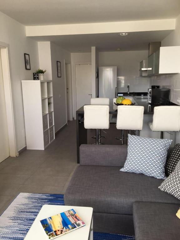A kitchen or kitchenette at MOGAN PEARL - POOL - DOUBLE TERRACE - OCEAN VIEW - BEACH - WIFI - WONDERFUL Complex - FREE DIGITAL TRAVEL GUIDE