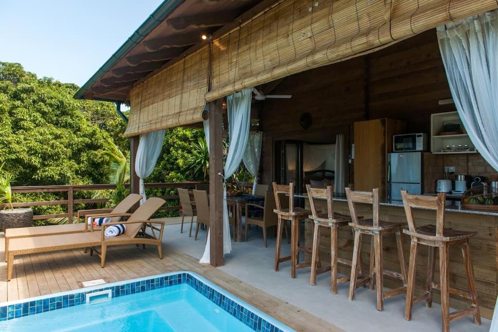 Imagine din galeria proprietății La Pointe Beach Huts în Anse Possession
