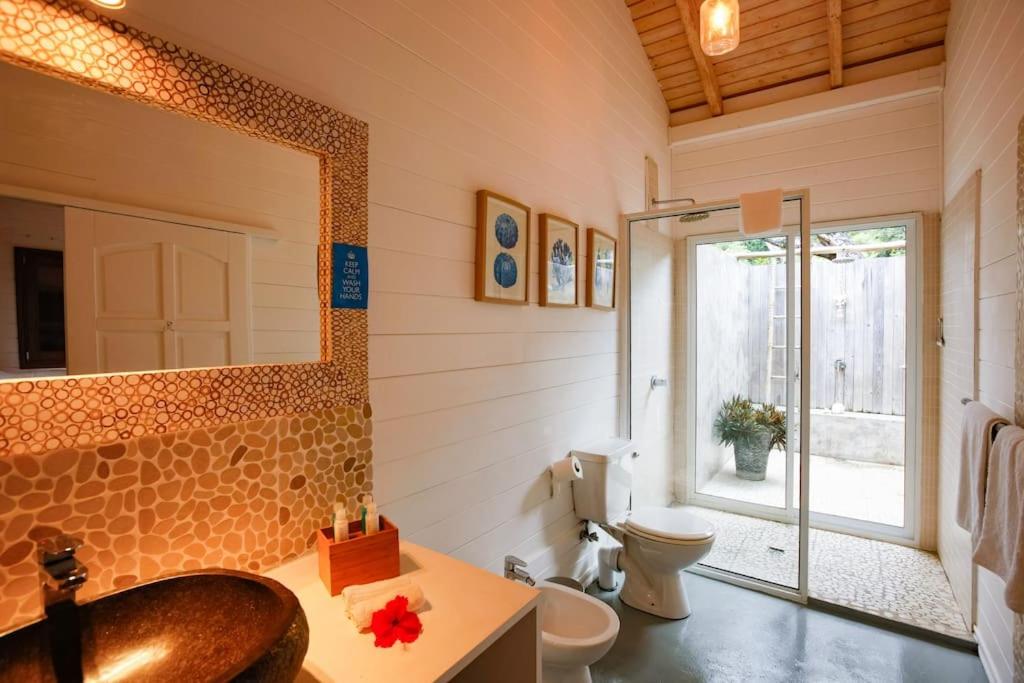 Imagine din galeria proprietății La Pointe Beach Huts în Anse Possession