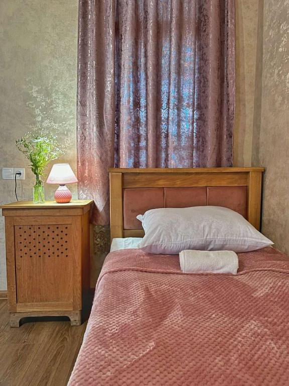 Postel nebo postele na pokoji v ubytování guest house zizi