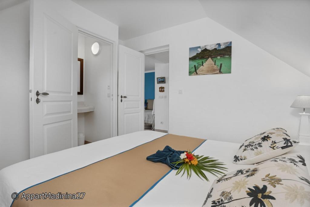 Postel nebo postele na pokoji v ubytování Appartement Madinina 6 personnes vue sur mer dans village vacances