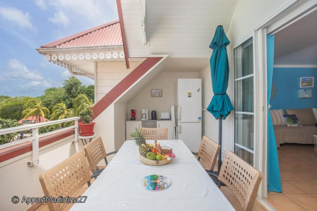 Balkón nebo terasa v ubytování Appartement Madinina 6 personnes vue sur mer dans village vacances