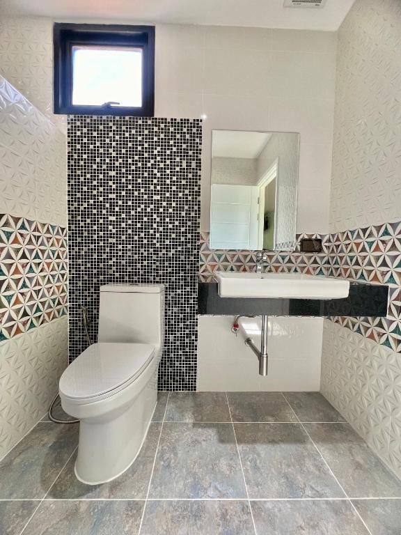 Koupelna v ubytování Napdown Resort Trat นับดาว รีสอร์ท ตราด