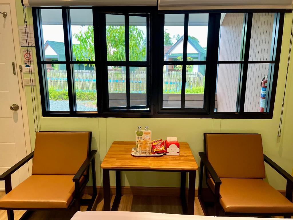 Posezení v ubytování Napdown Resort Trat นับดาว รีสอร์ท ตราด