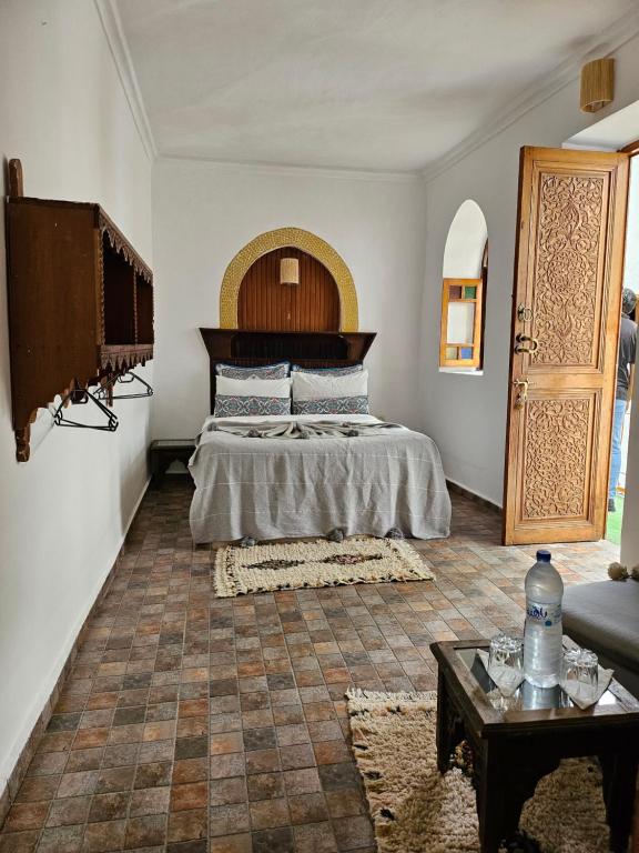 Postel nebo postele na pokoji v ubytování Riad O LY