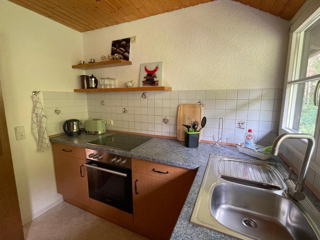 Kuchyň nebo kuchyňský kout v ubytování Mansarde Hesselbach