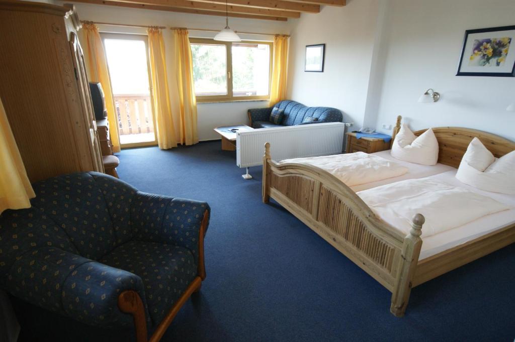 Postel nebo postele na pokoji v ubytování Hotel Beinbauer