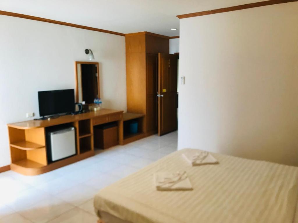 Postel nebo postele na pokoji v ubytování Global Hotel Beach View