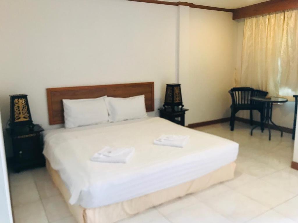 Postel nebo postele na pokoji v ubytování Global Hotel Beach View