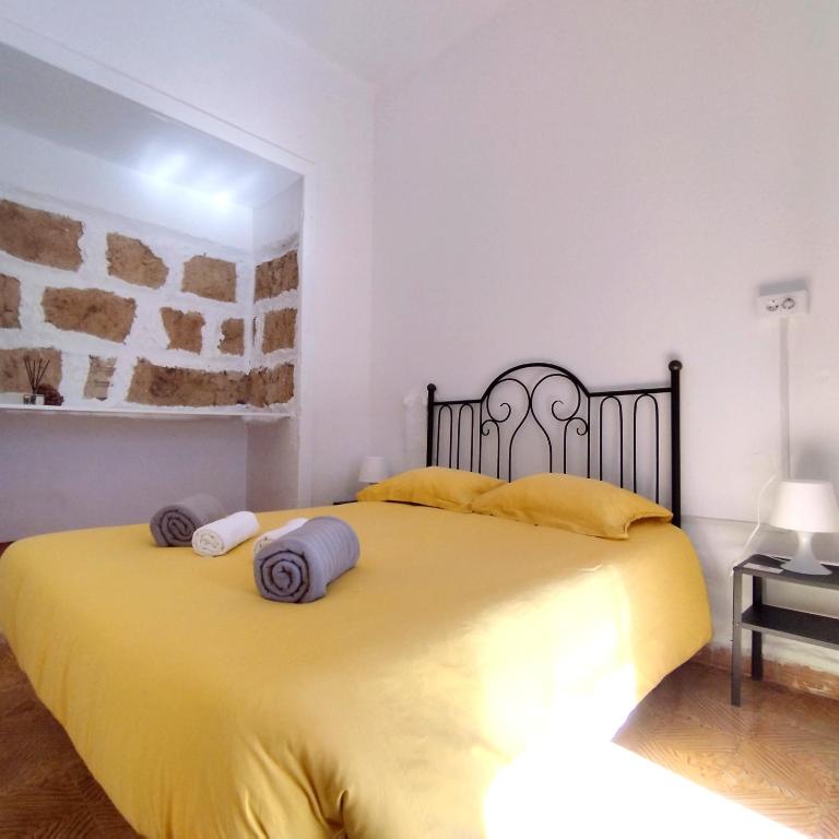 Postel nebo postele na pokoji v ubytování La Casita