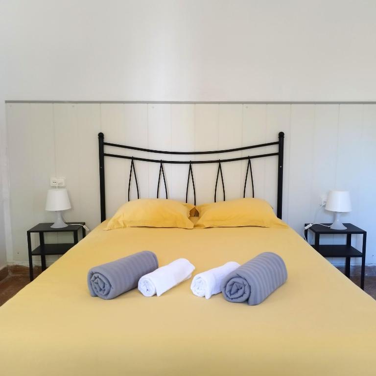 Postel nebo postele na pokoji v ubytování La Casita