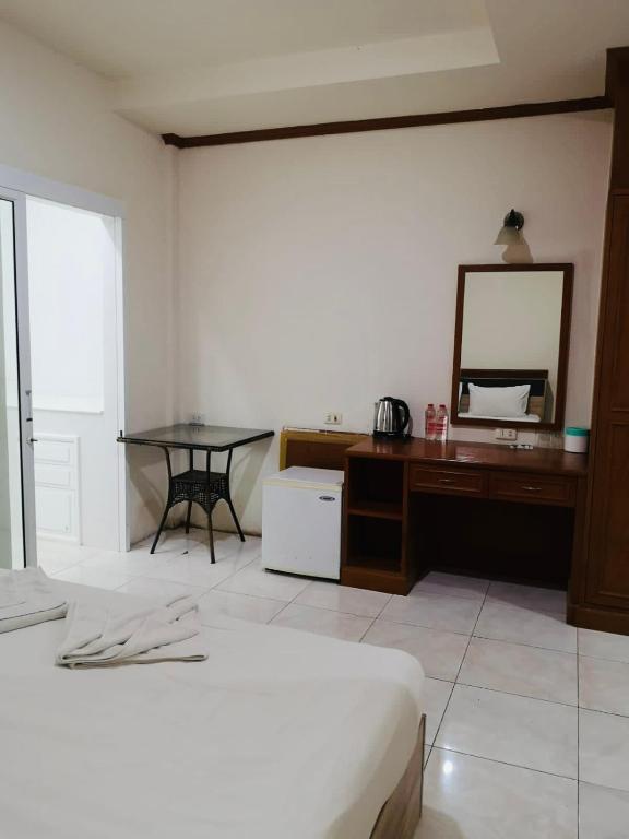 Postel nebo postele na pokoji v ubytování Global Hotel Beach View