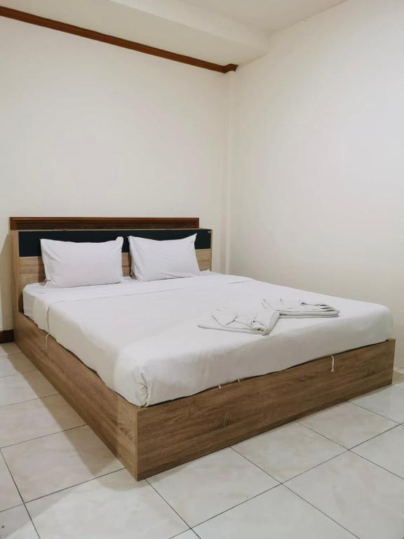 Postel nebo postele na pokoji v ubytování Global Hotel Beach View