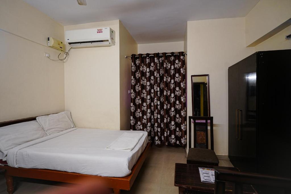 Postel nebo postele na pokoji v ubytování Hotel Golden Rooms