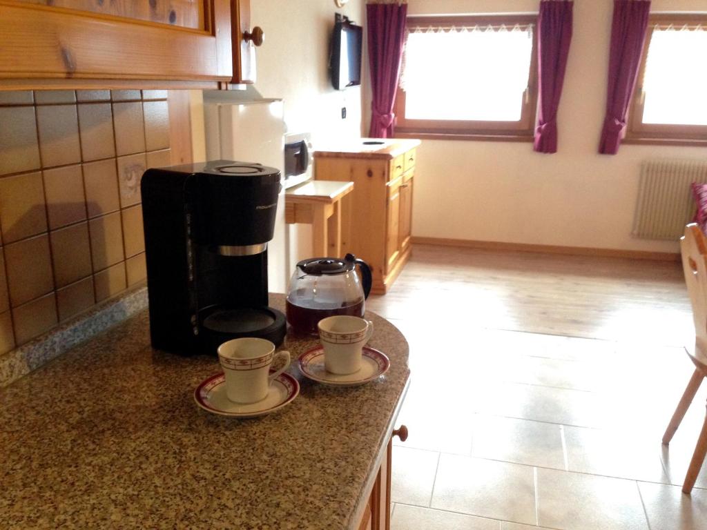 Zestaw do parzenia kawy i herbaty w obiekcie Residence Villa Boschetto
